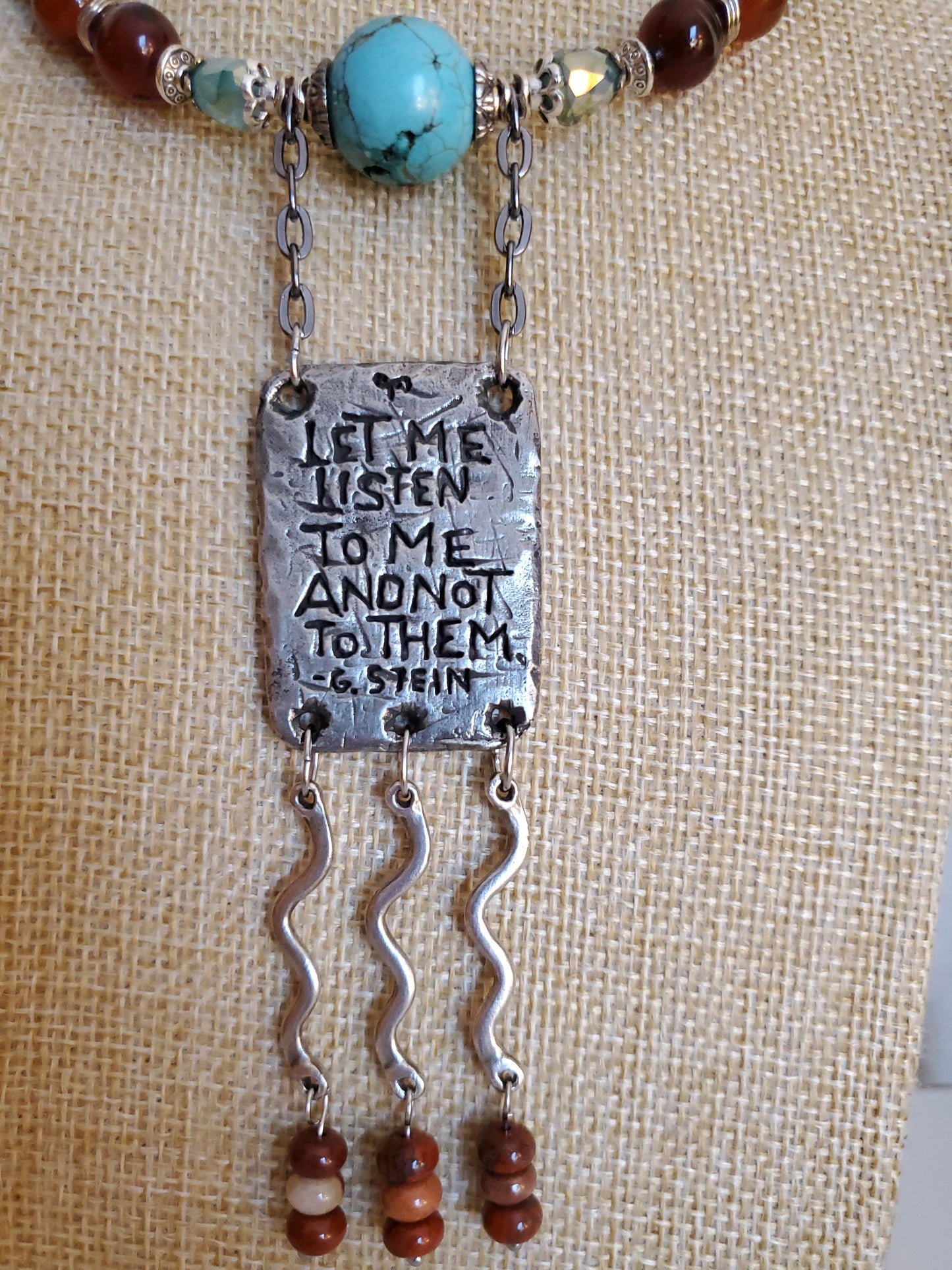 This Shell Pewter Pendant Necklace is Wearable Art